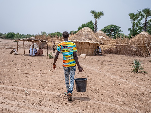 In Nigeria, a cbm-funded field worker delivers sight-saving medicine to remote villages.