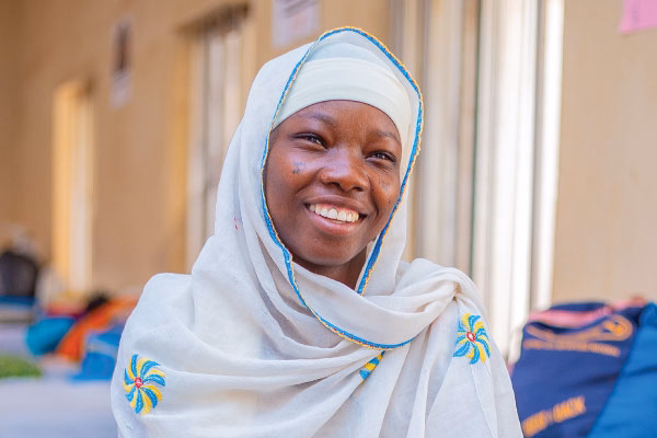 Arziki smiling after successful fistula surgery, her health and dignity restored through cbm-supported care in Nigeria