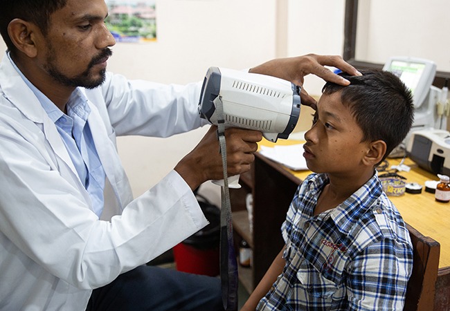 Samarpan in Nepal awaiting sight-saving cataract surgery.