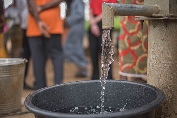 Safe, clean water from a repaired borehole in Nigeria.